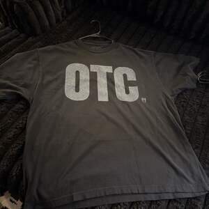 Travis Scott x WWE OTC Roman Reigns T-Shirt in Black